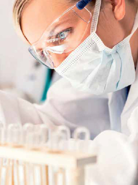 Laboratory assistant with HACCP equipment.